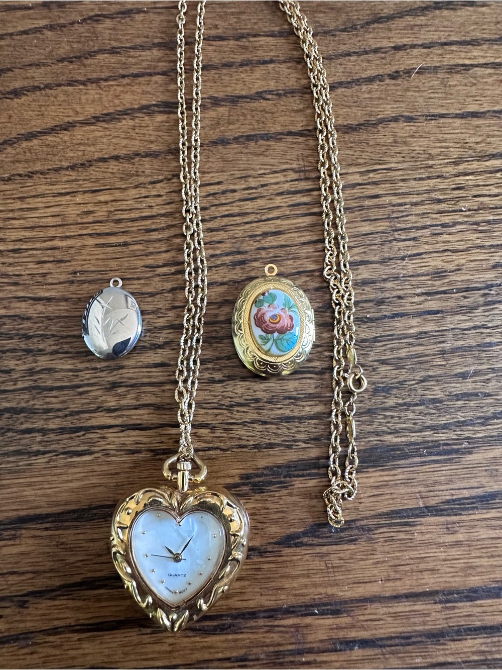 Trio of Gold Heart Pendant Watch Necklace with 2 Floral Lockets.  Vintage